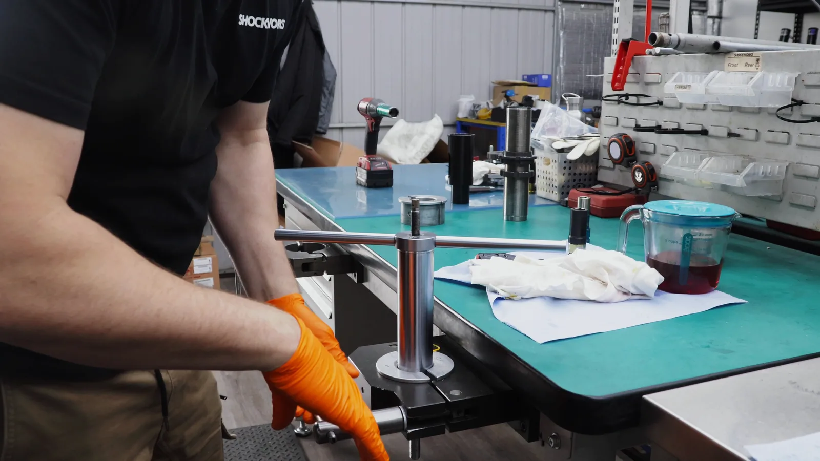 The coilover build bench at the Monbulk workshop