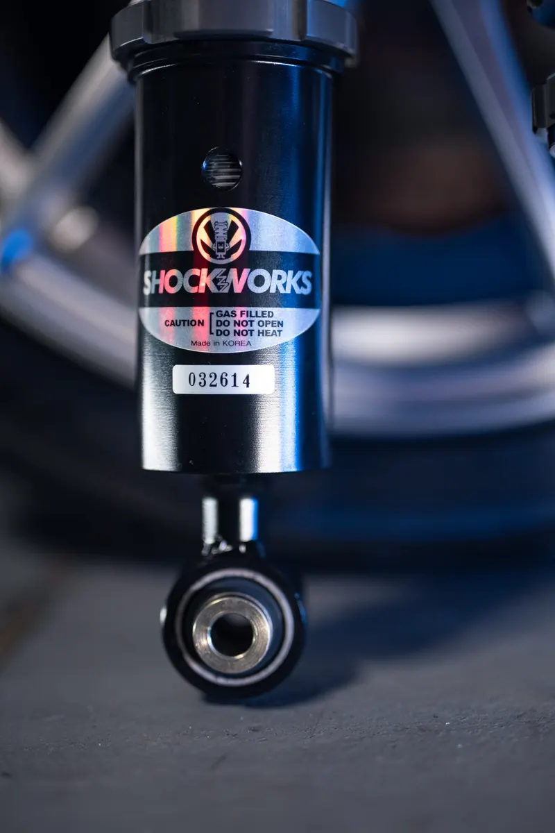 The lower damper body and spherical bearing eyelet of a Shockworks coilover
